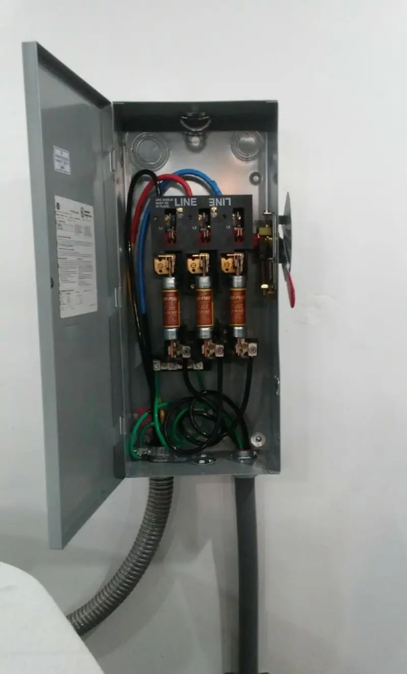 Three-phase disconnect switch installed for Smoke Detector Installation in Liberal