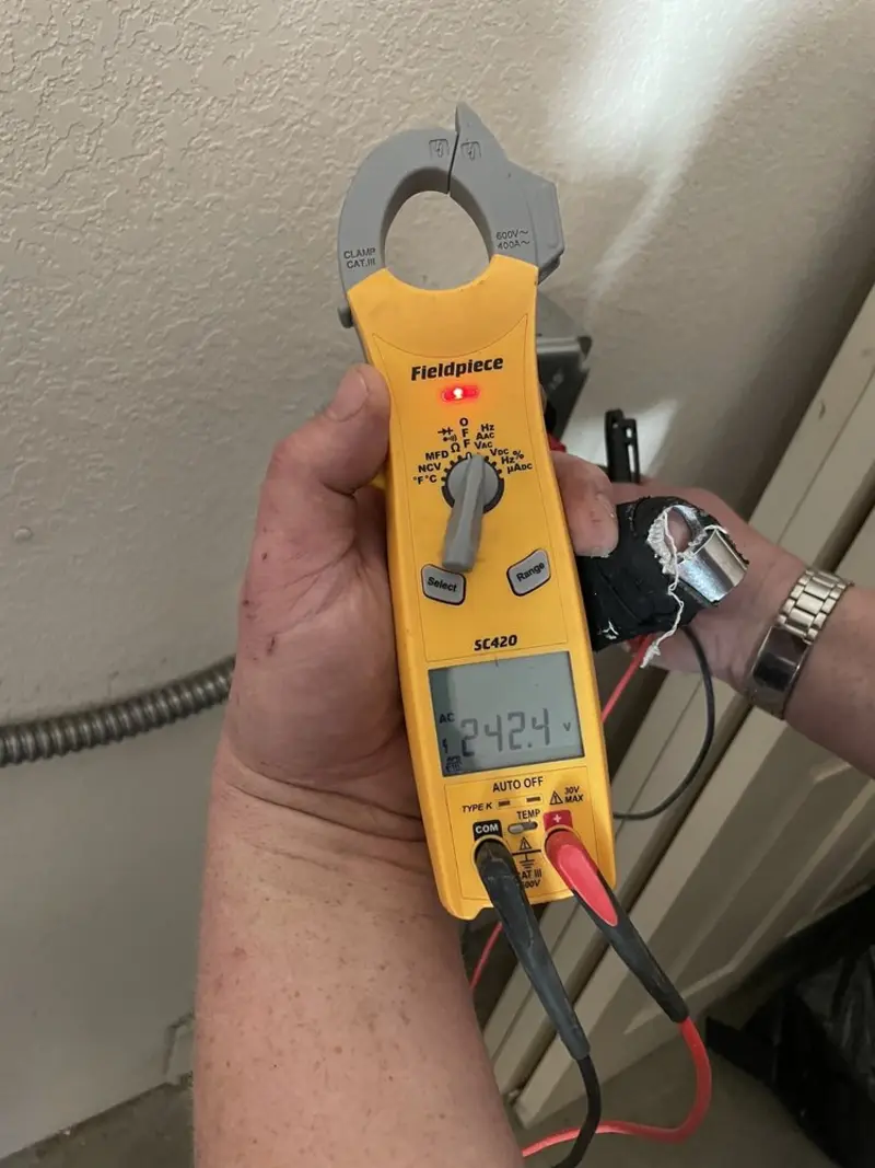 Voltage testing with clamp meter during Hot Tub / Pool Electrical Wiring in Liberal